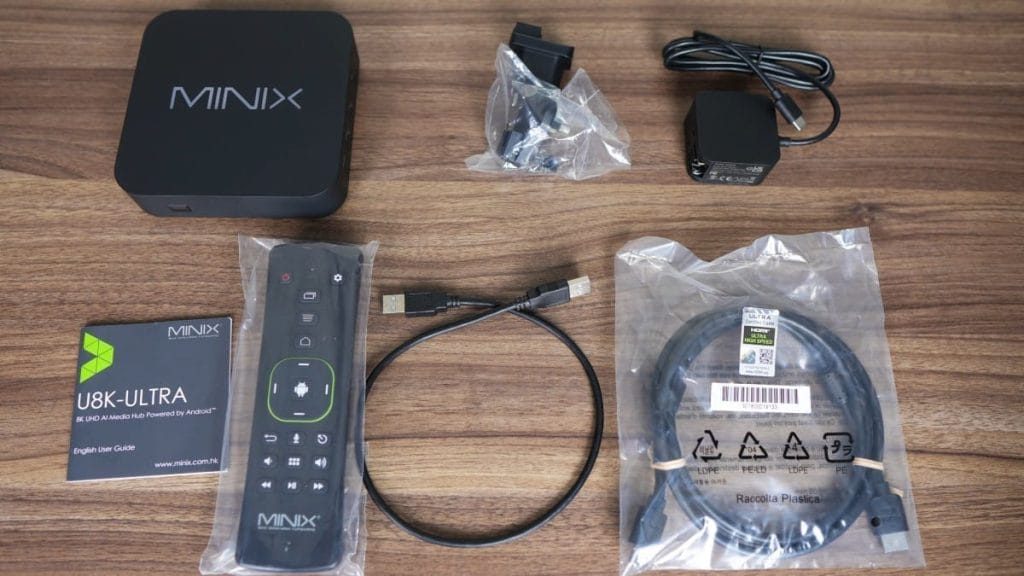 MINIX U8K-ULTRA 8K UHD AI media hub with accessories: remote, cables, and power adapter