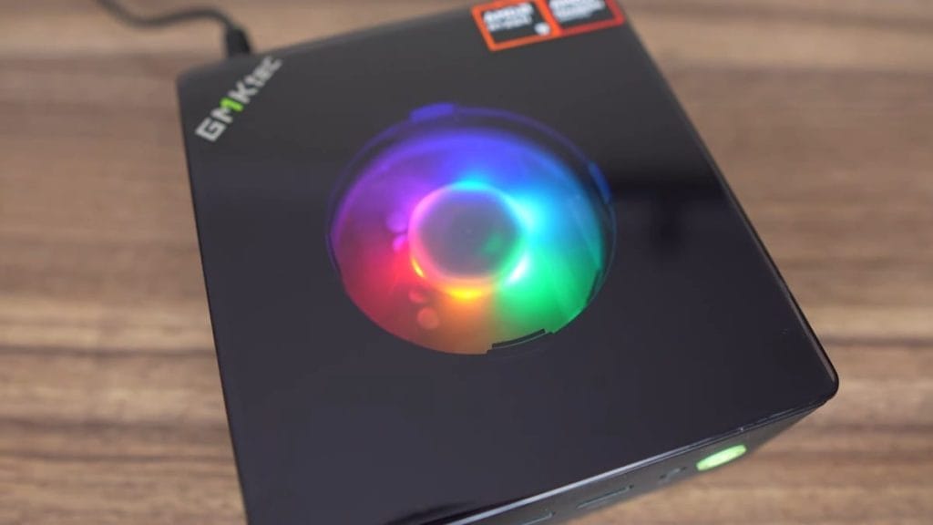 The GMKtec K11 device with RGB lighting in a black casing.