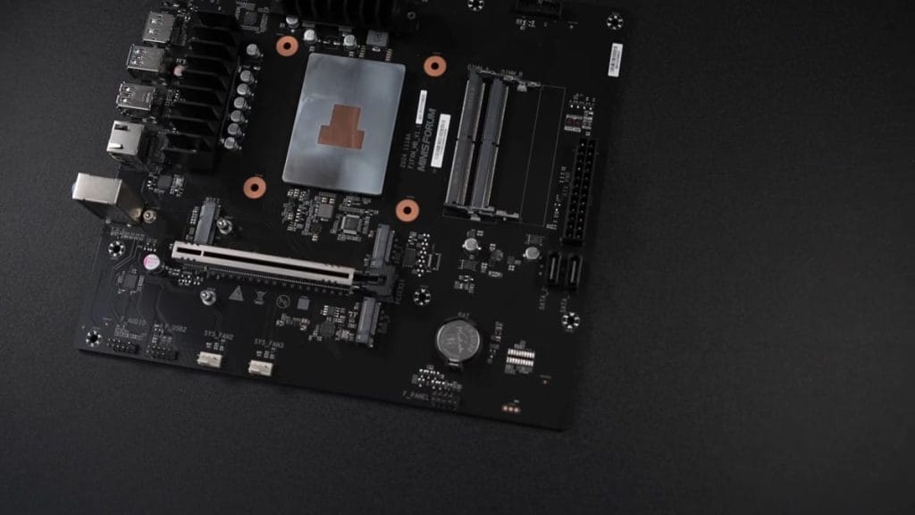 Motherboard with cooling, PCIe slot, and USB ports.