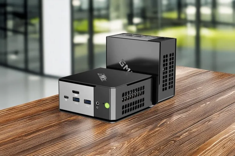 GMKtec EVO-X1 Review: The Most Powerful AMD Mini PC Yet?GMKtec EVO-X1 with multiple USB ports and a sleek design, set on a wooden table.