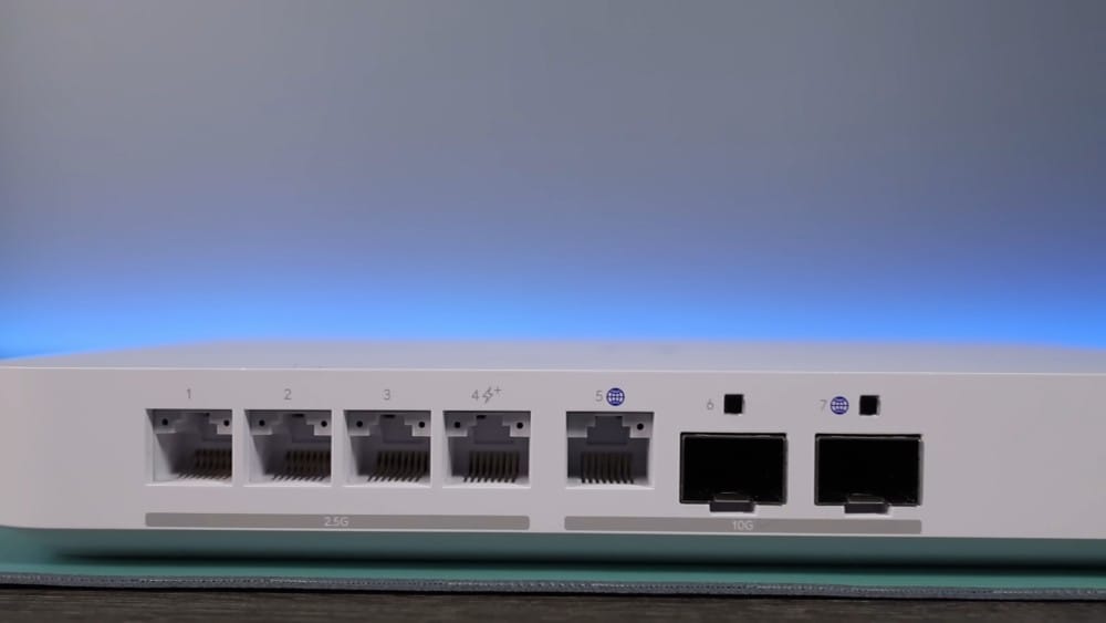 A network switch with multiple Ethernet ports labeled for 2.5G and 10G connections, used for high-speed networking.