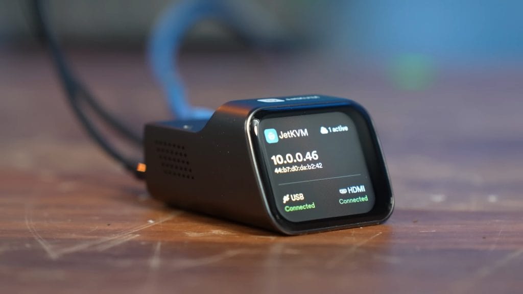 A JetKVM device displaying network settings and connections including USB and HDMI status.