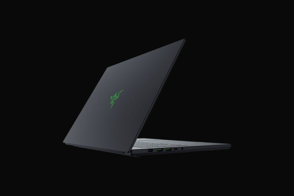A sleek Razer laptop showcasing its modern design and iconic logo against a dark background.