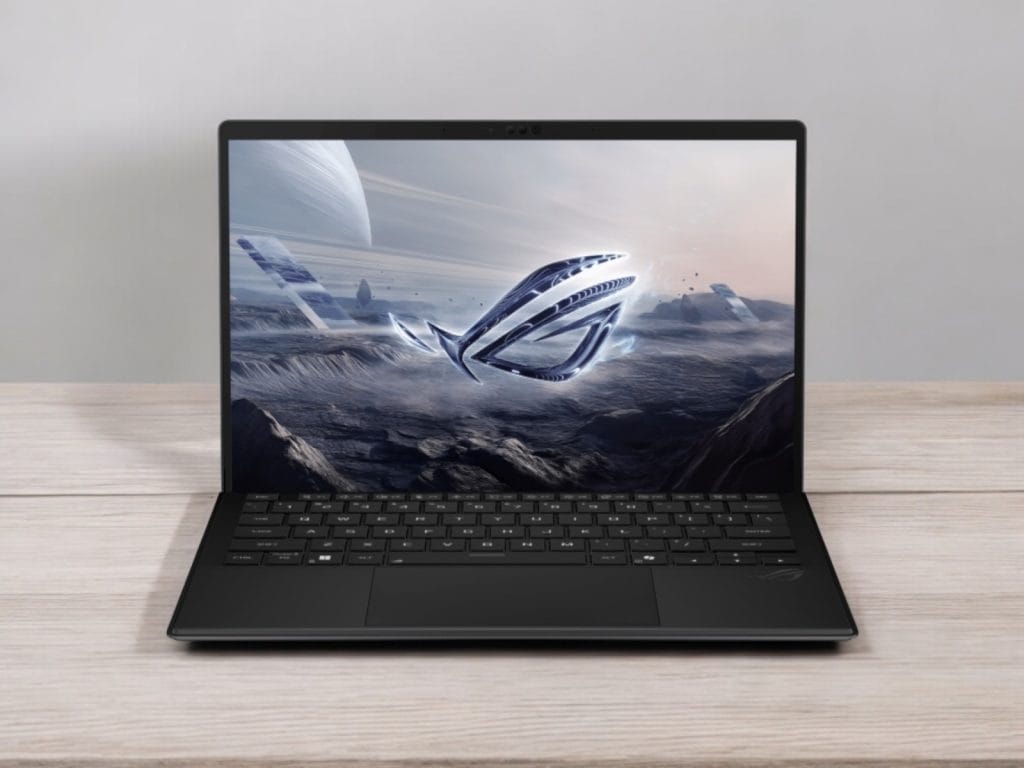 Asus ROG Flow Z13 2025. A sleek laptop with a futuristic design displaying space-themed graphics on the screen.