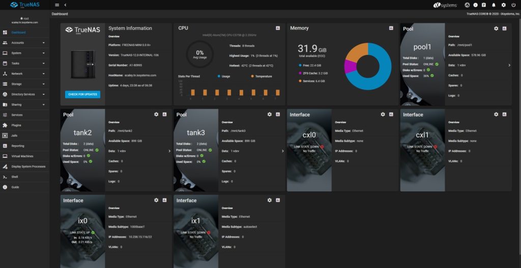 TrueNAS CORE web interface dashboard displaying system information, CPU usage, memory details, storage pools, and network interfaces with status indicators.